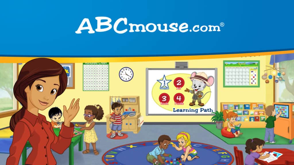 Cartoon classroom scene with a female teacher waving, children playing and learning, educational posters on the walls, and a screen showing ABCmouse.com and a mouse character on a learning path diagram.